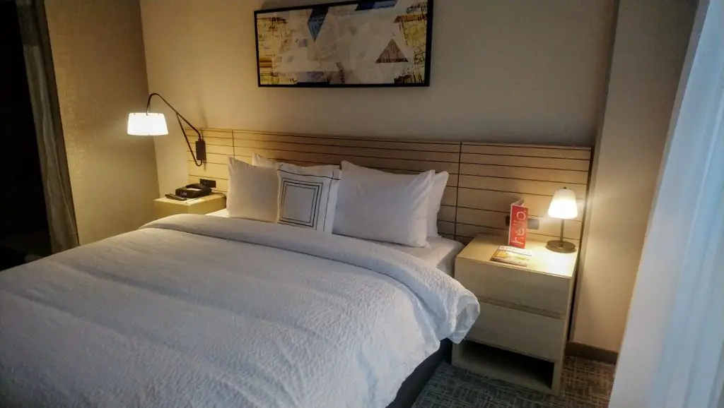 A bed in a hotel room