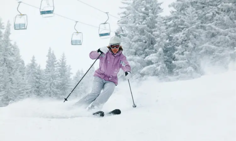 Picture of a skier, doing skiing in Aspen Snowmass under the lifts