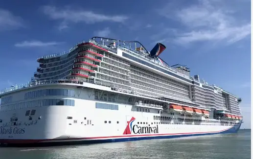 The picture shows a carnival cruise ship while writing the article on how late you can add someone to a carnival cruise.
