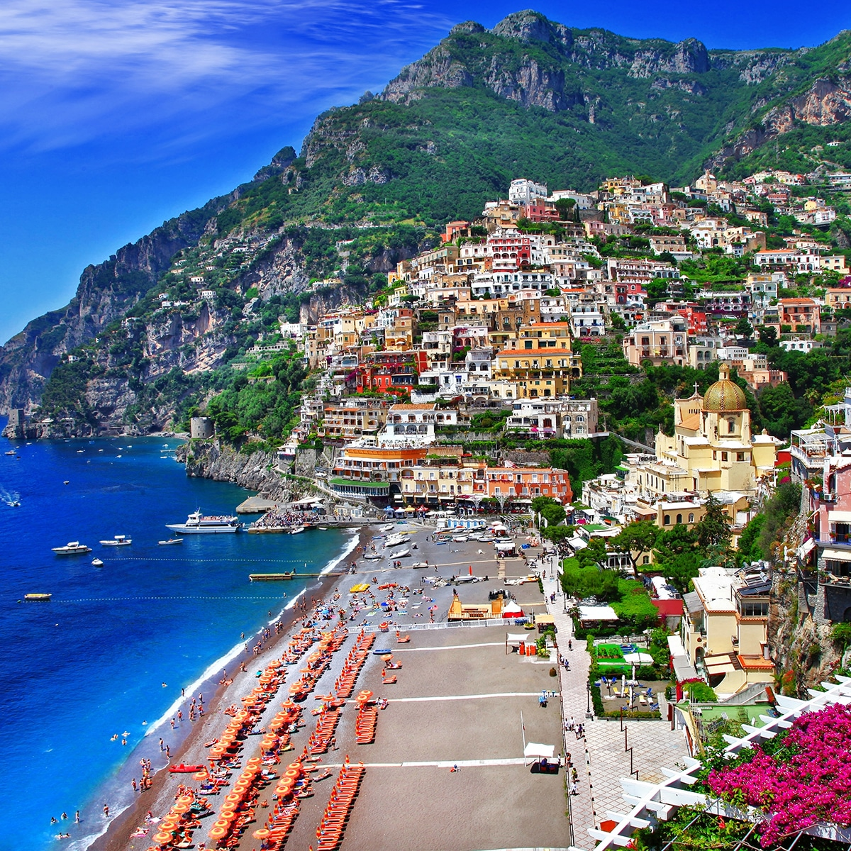 Picture shows the Amalfi Coast view where mountains are visible