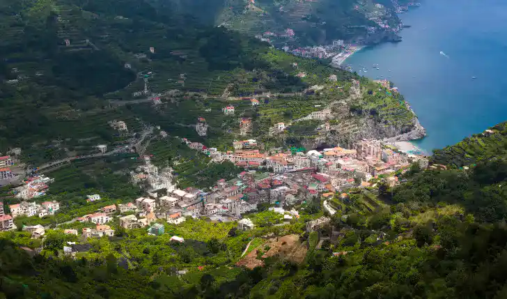 The town of Ravello is shown in the picture which is taken from the mountain side towards the beach