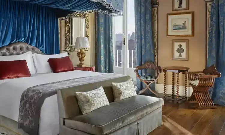 The picture shows old styled room of St. Regis hotel in Florence, Italy
