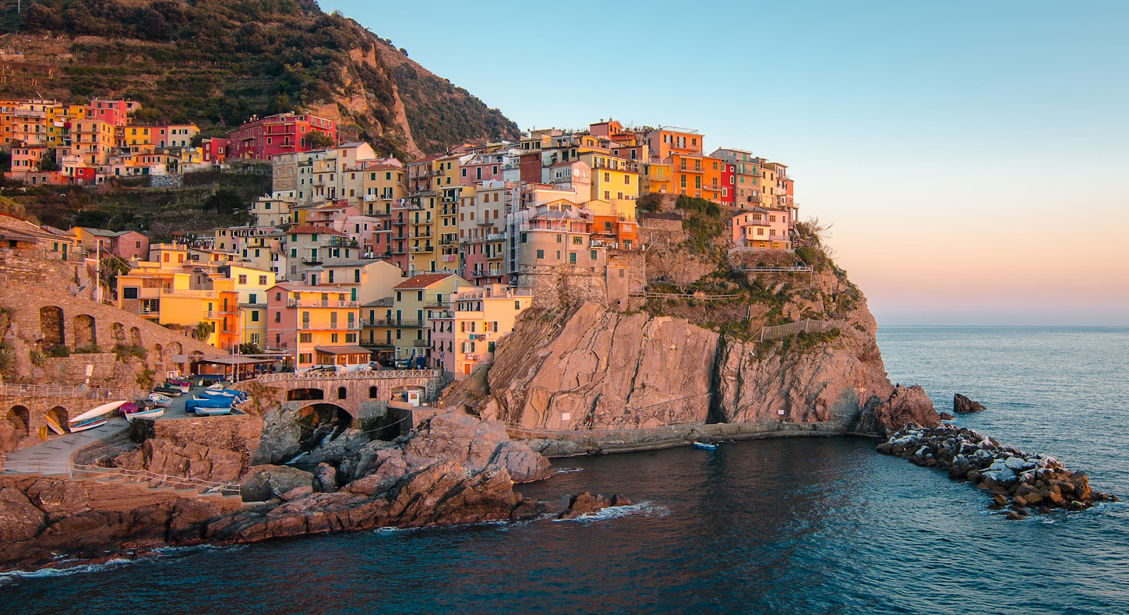 Picture shows view of Cinque Terre in Italy which is famous for its beautiful landscape and mountains, overlooking Mediterranean sea 