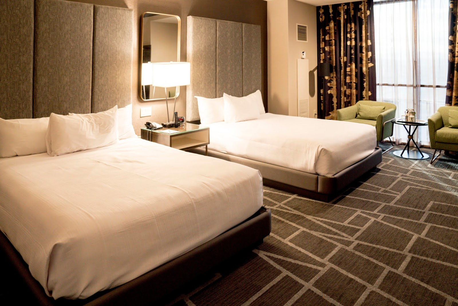 Luxor tower room is shown with two beds having a modern feel