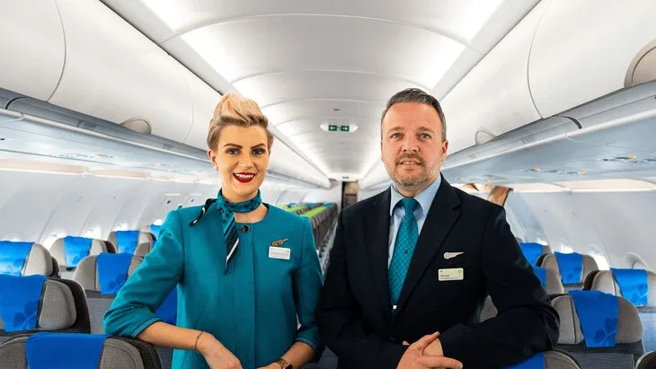 Picture shows Aer Lingus stewards inside of an aircraft