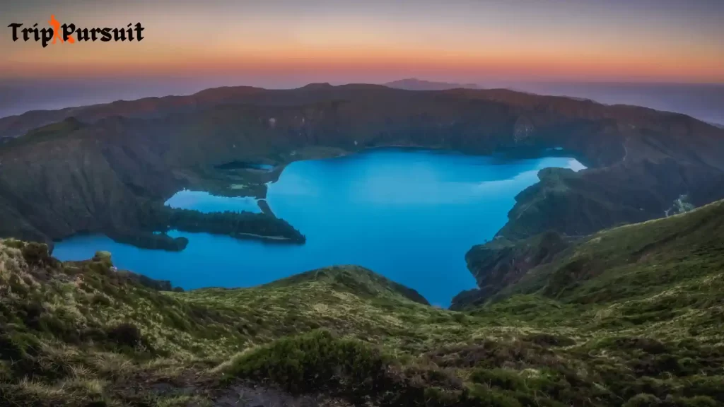 Picture show the view of Lagoa do Fogo, Azores island while comparing it against Canary islands