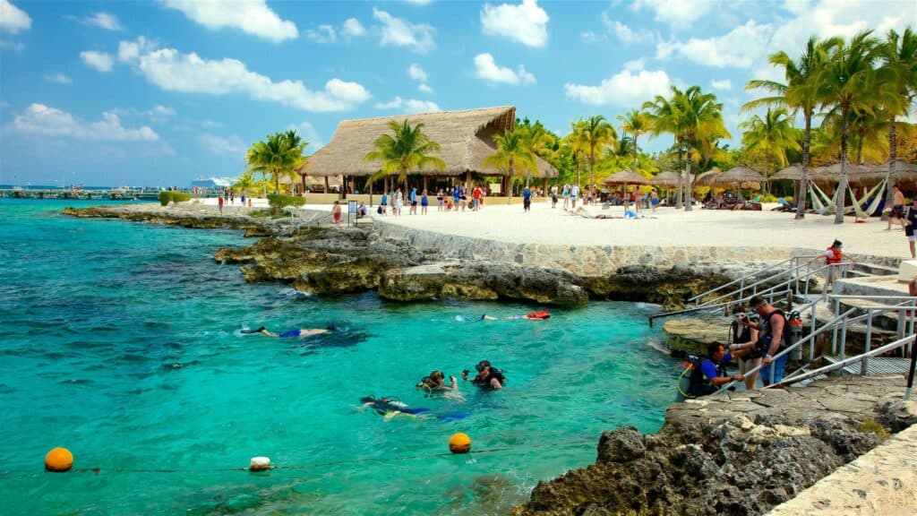 View of Chankanaab Adventure Beach Park in Cozumel, Mexico, featuring clear turquoise waters, lush greenery, and exciting activities, perfect for a Scarlet Lady shore excursion